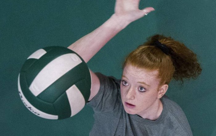 Abbie Jackson '19 getting ready to spike volleyball